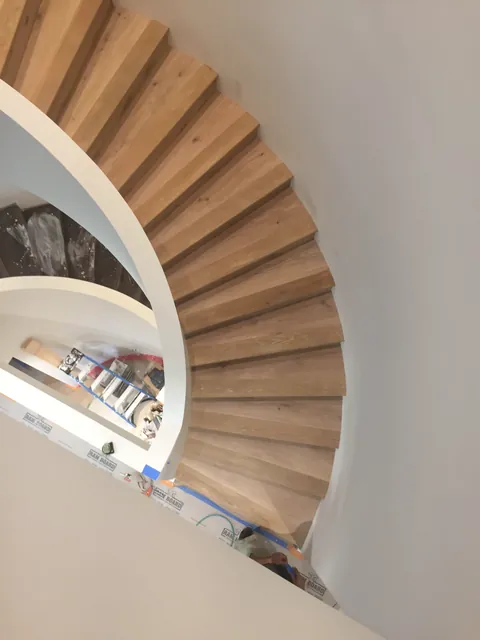 Custom hardwood staircase by SHS Hardwood Flooring