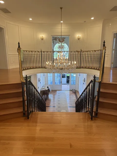 Custom hardwood staircase by SHS Hardwood Flooring