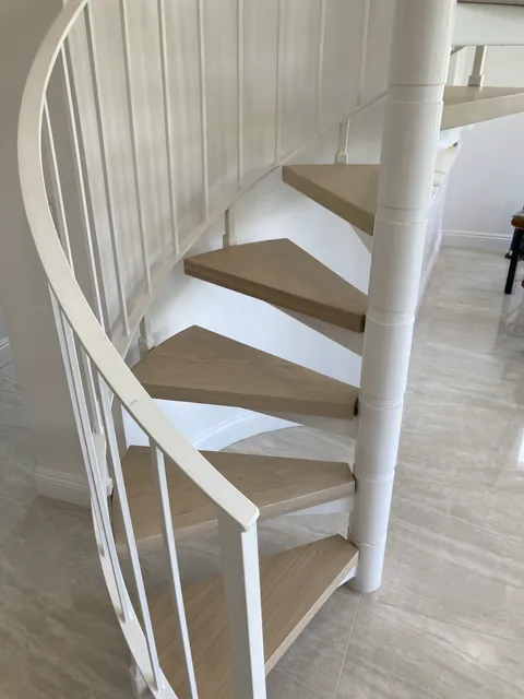 Custom hardwood staircase by SHS Hardwood Flooring