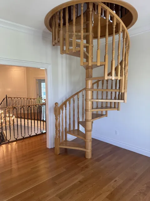 Custom hardwood staircase by SHS Hardwood Flooring