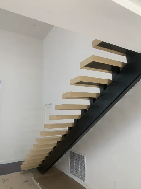 Custom hardwood staircase by SHS Hardwood Flooring