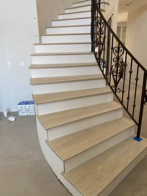 Custom hardwood staircase by SHS Hardwood Flooring