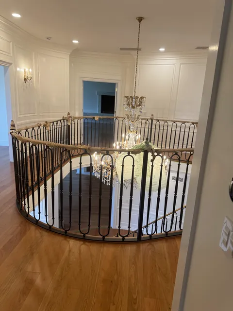 Custom hardwood staircase by SHS Hardwood Flooring