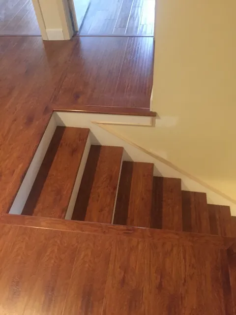 Custom hardwood staircase by SHS Hardwood Flooring