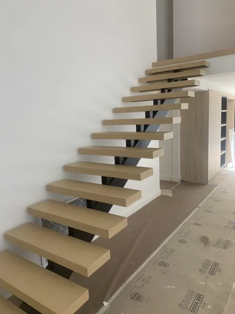 Custom hardwood staircase by SHS Hardwood Flooring