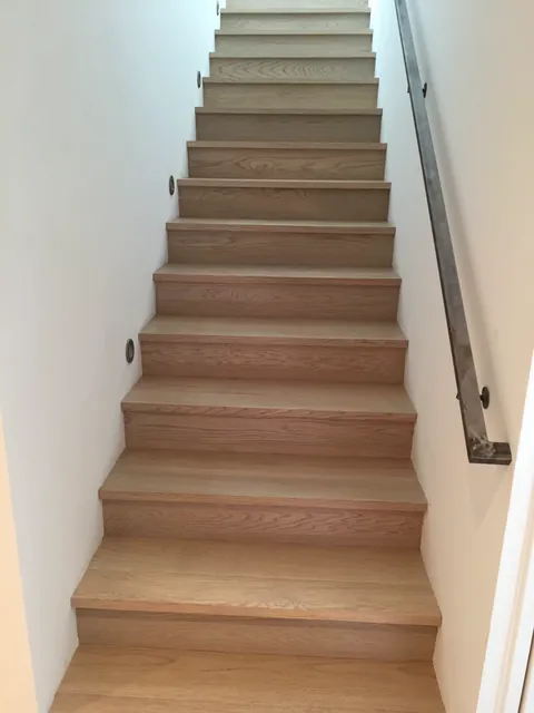 Custom hardwood staircase by SHS Hardwood Flooring