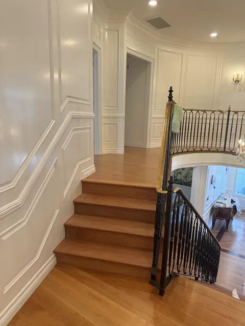 Custom hardwood staircase by SHS Hardwood Flooring