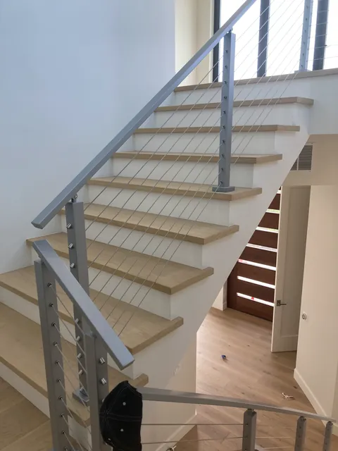 Custom hardwood staircase by SHS Hardwood Flooring
