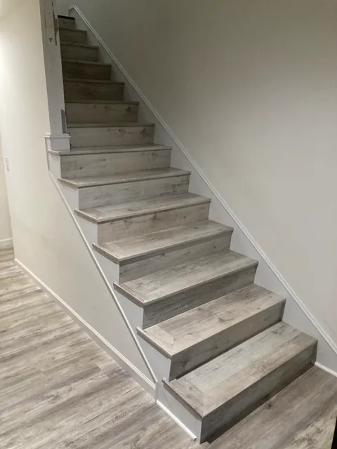 Custom hardwood staircase by SHS Hardwood Flooring